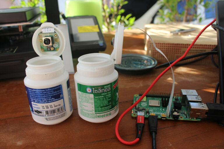 Install Bottle Raspberry Pi Tutorial DIY ที่ยึดโมดูลกล้อง Raspberry Pi ด้วยขวดหมากฝรั่ง - CNX Software