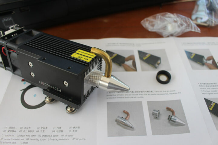 Laser module air assist protective window air nozzle